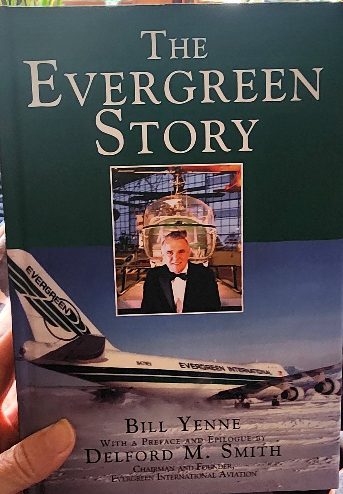 Hardcover book The Evergreen Story by Bill Yenne with a preface and epilogue by Delford M. Smith